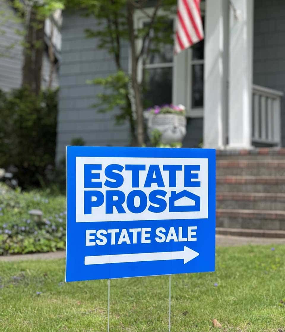 estate-pros-sign-in-front-of-a-home