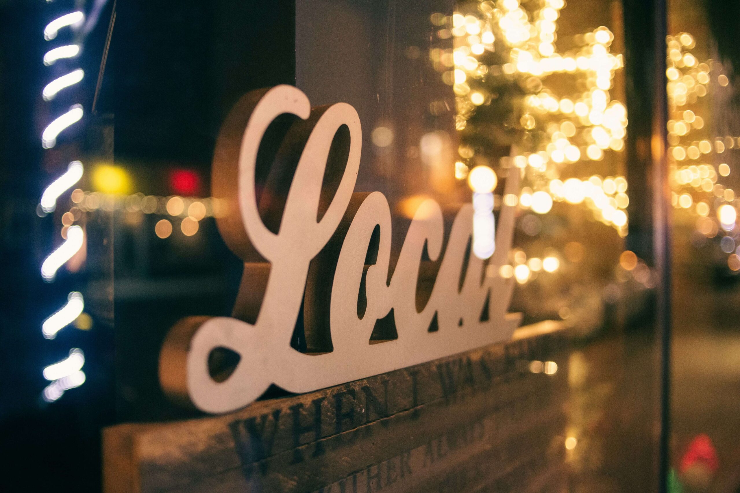 a sign in a window that says local