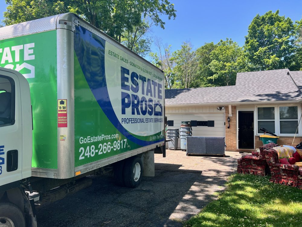 estate pros moving truck ready to take donations to a donation center