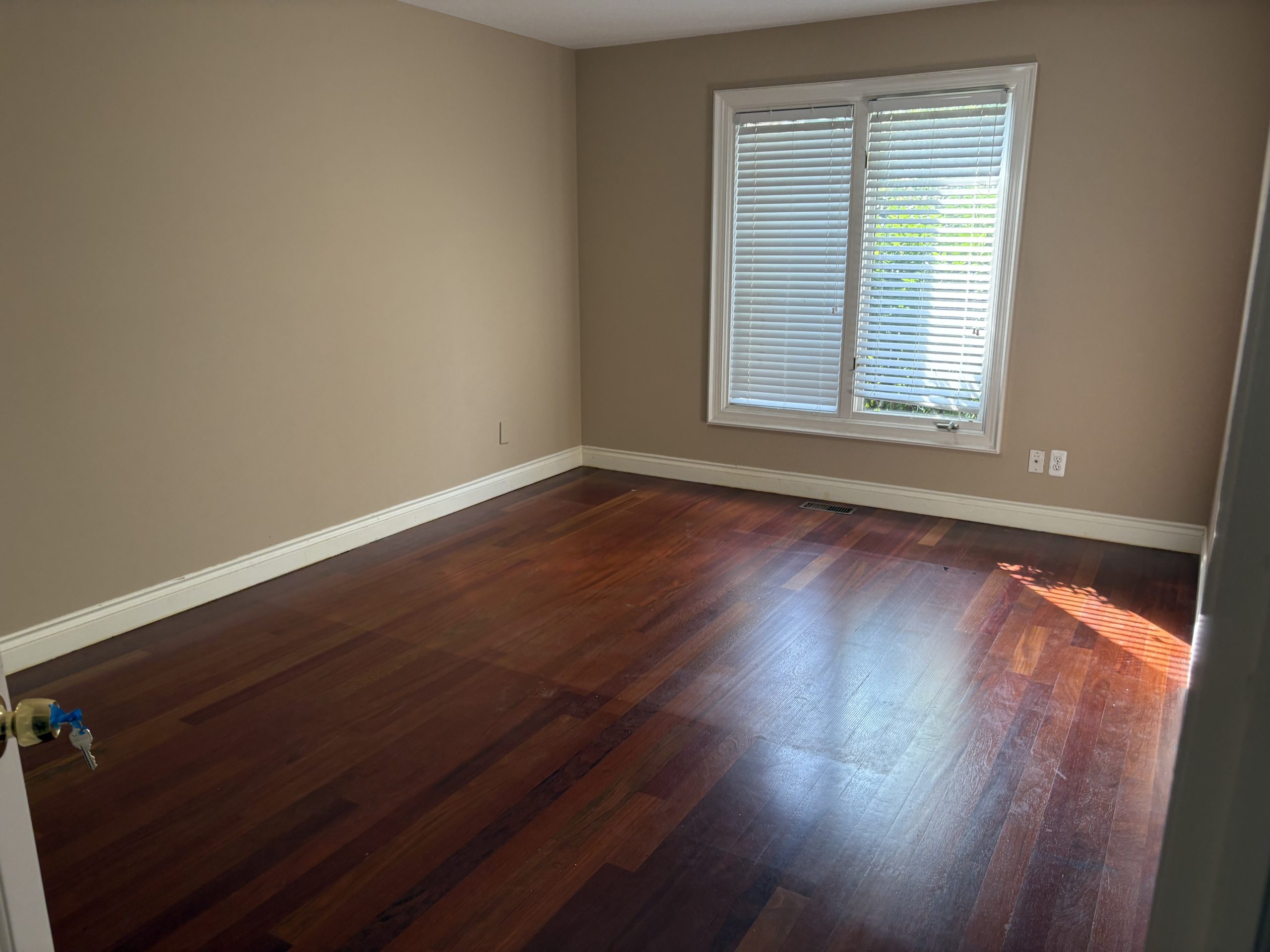 Empty bedroom after estate liquidation