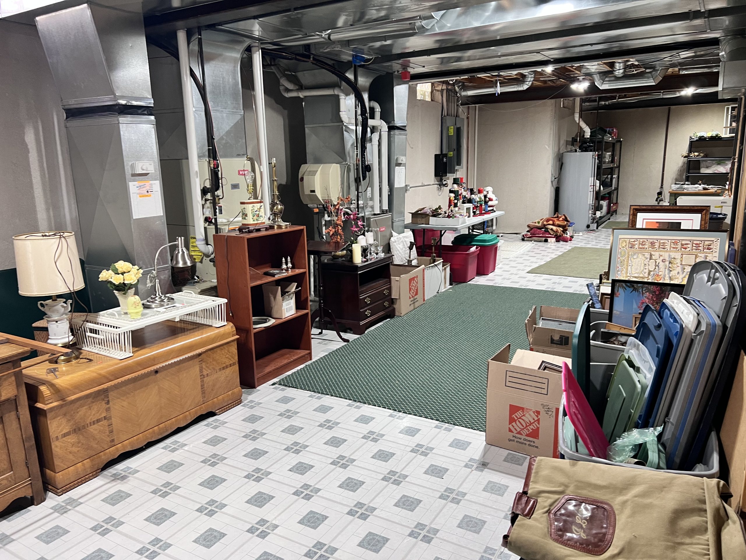 basement storage with christmas decor, antique furniture, tools, etc