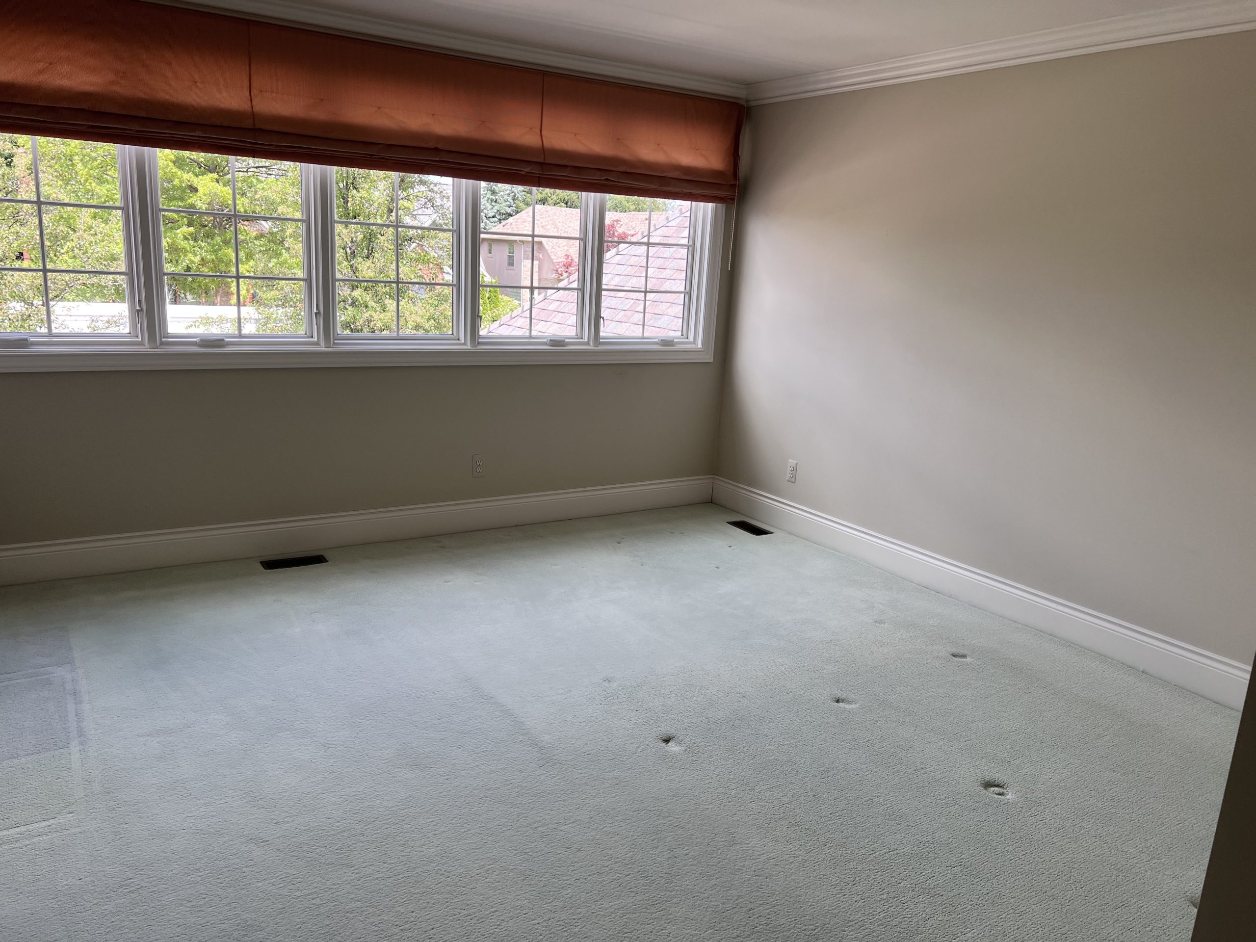 empty guest bedroom after estate sale