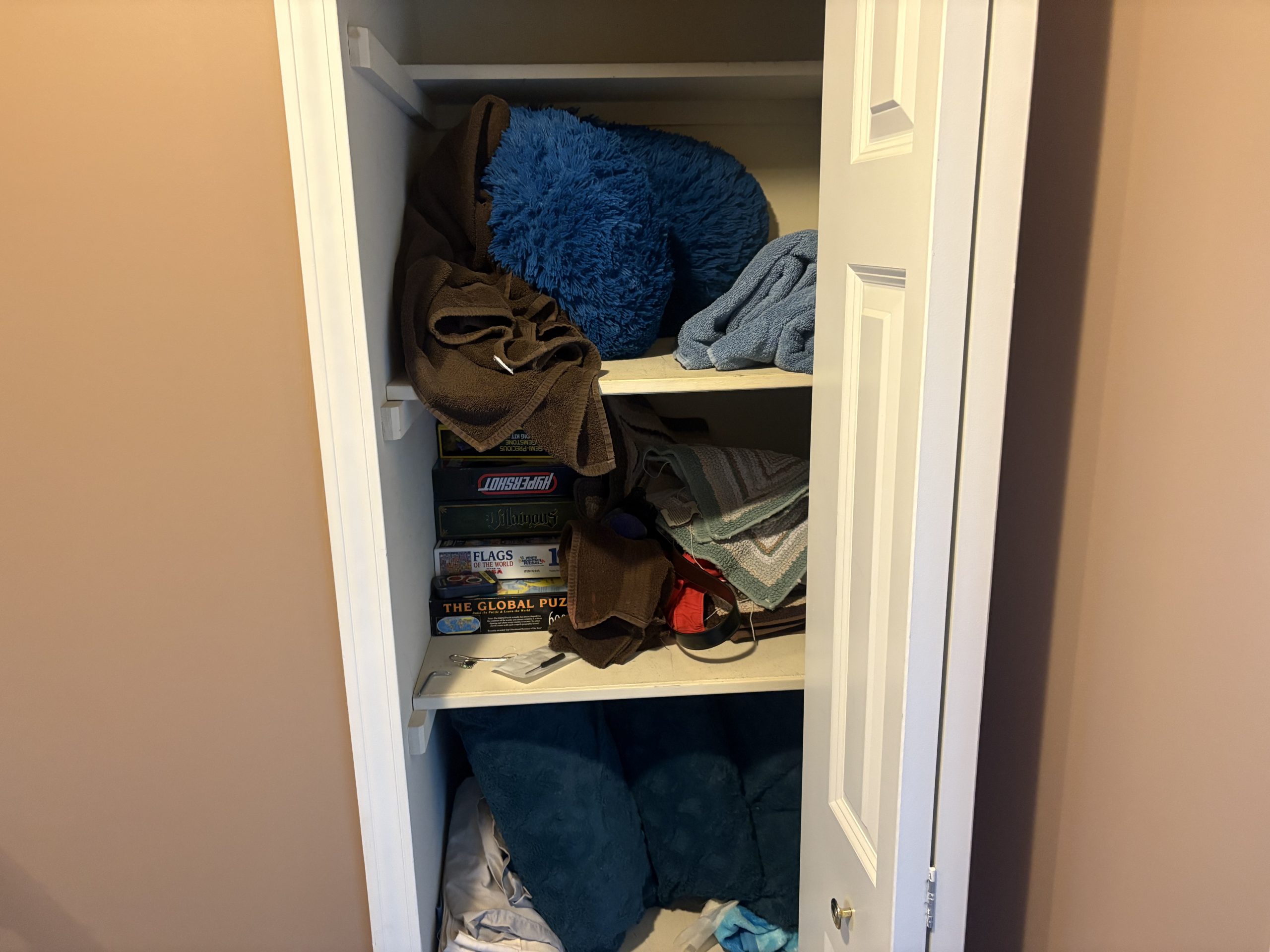 closet with towels
