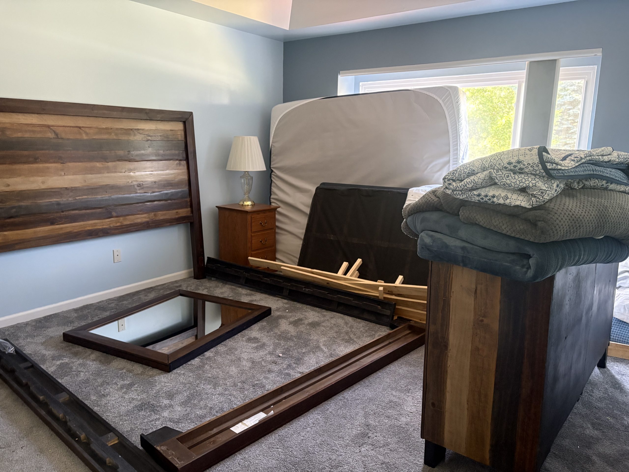 bedroom with king bed and mattresses