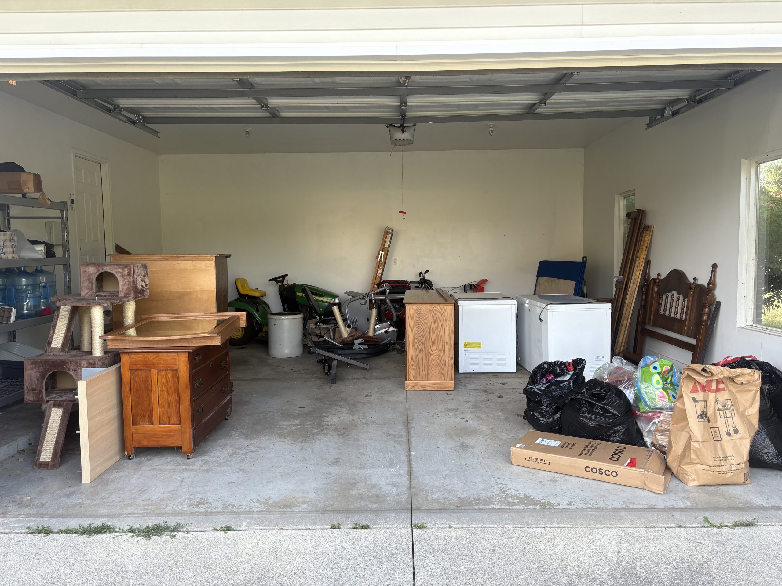 garage with freezers and boxes