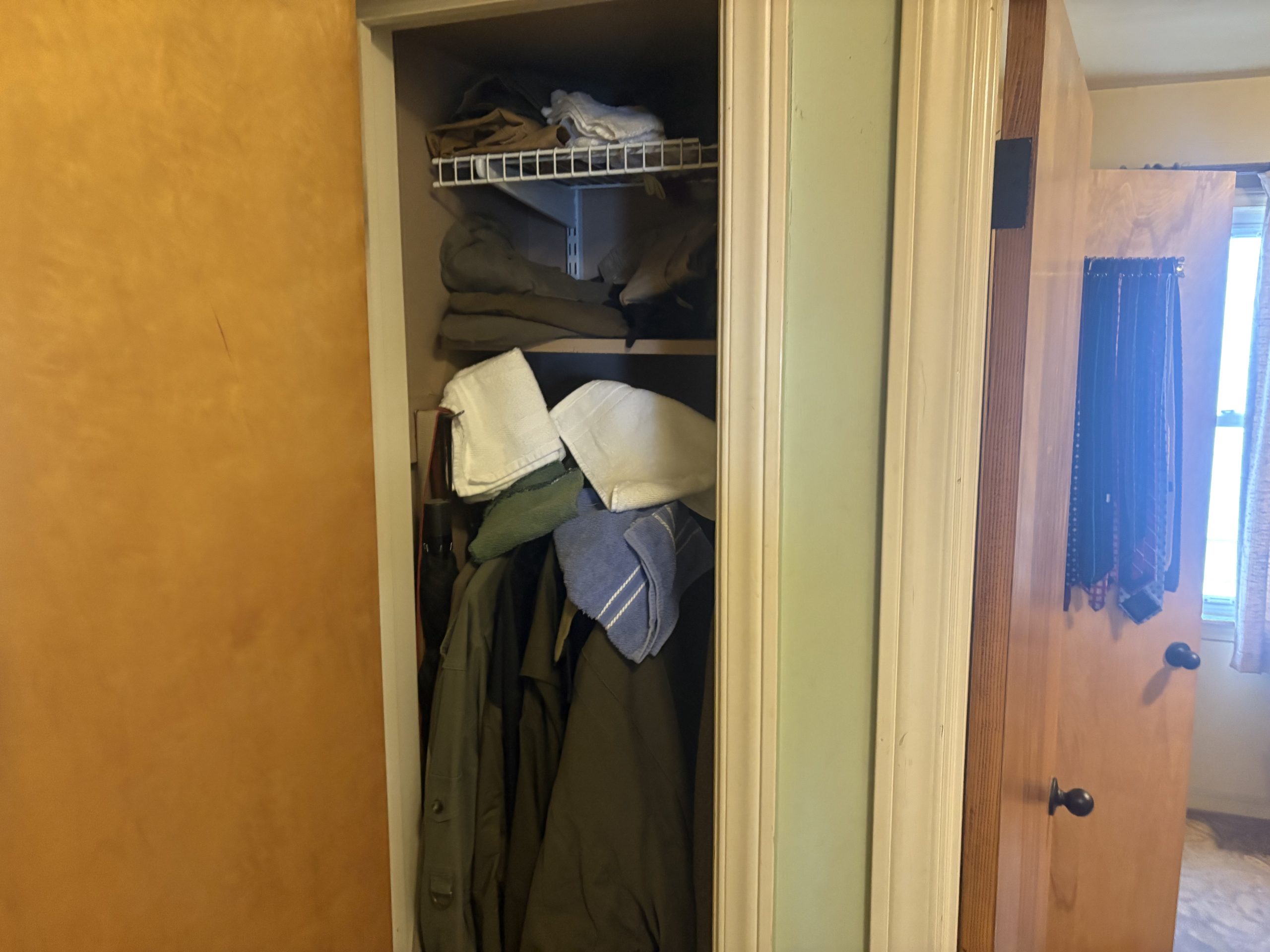 closet with clothes